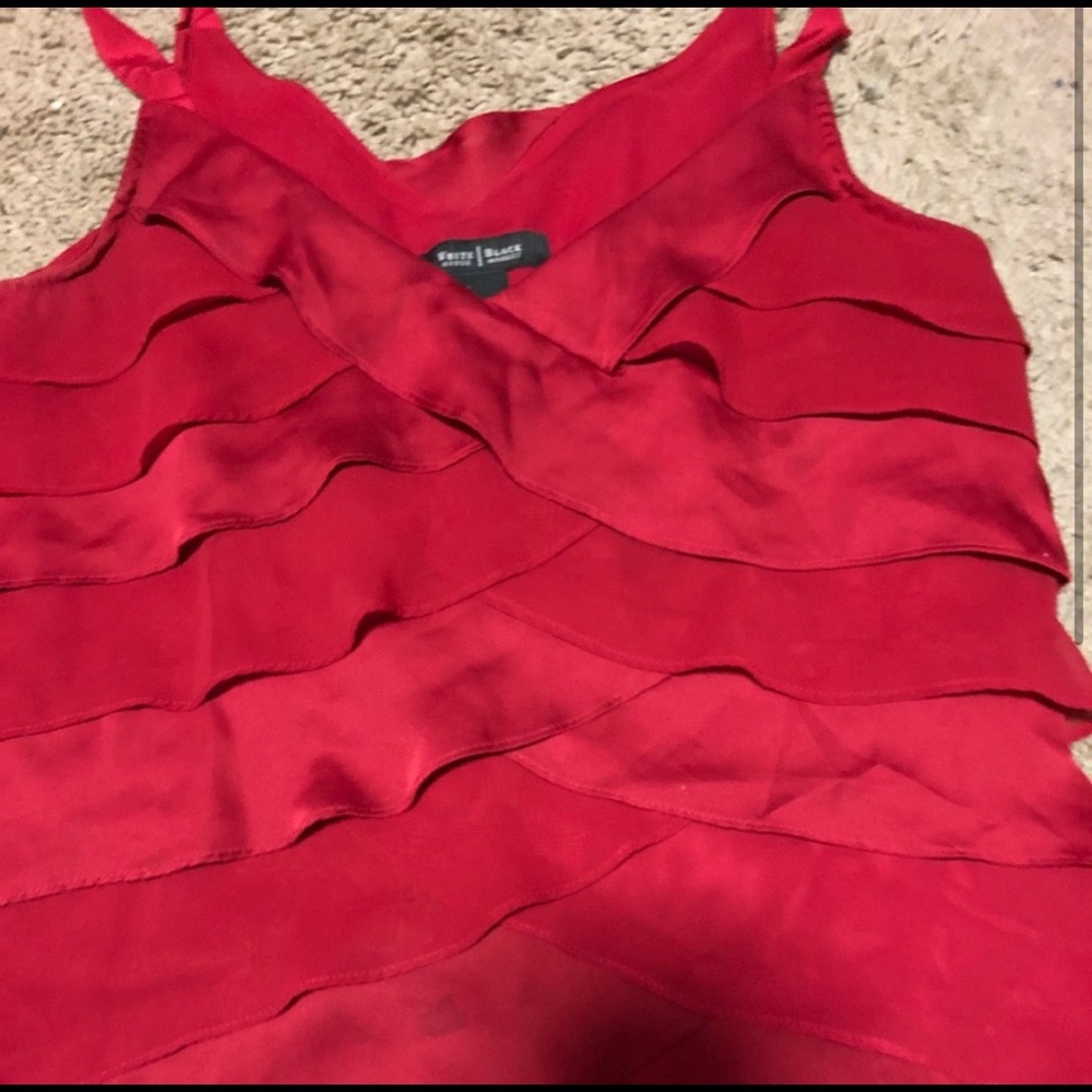 Red tank or shell under a jacket